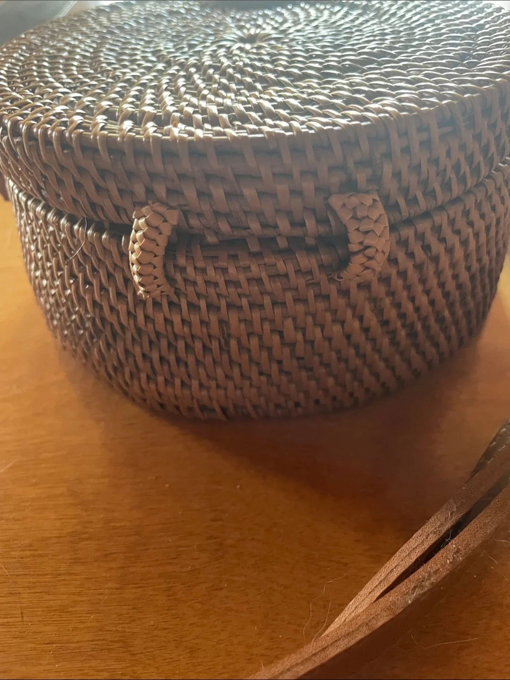 Round Woven Crossbody Bag in Brown